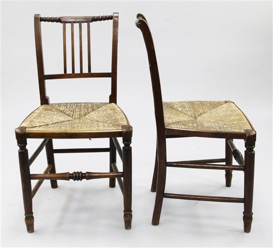 A set of six 19th century country rush seat dining chairs,